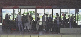 GROUPS WAITS FOR THE TRAIN